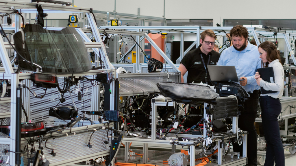 workers near manufacturing equipment